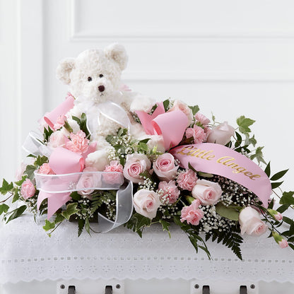 Touch of Sympathy Casket Spray – T & T FLORAL, Kingsley MI